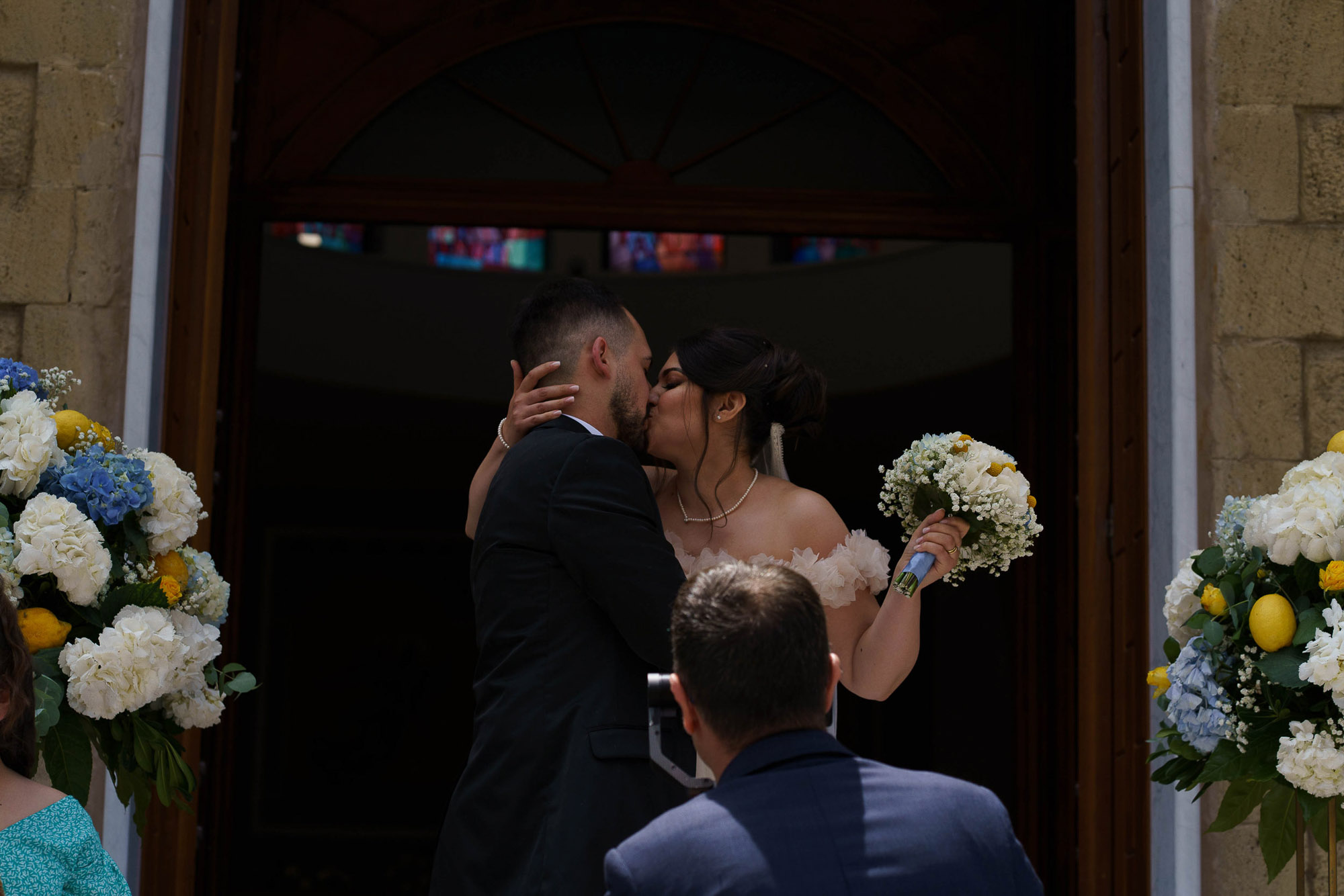Bride and groom sharing a candid moment during ceremony in Reading Berkshire